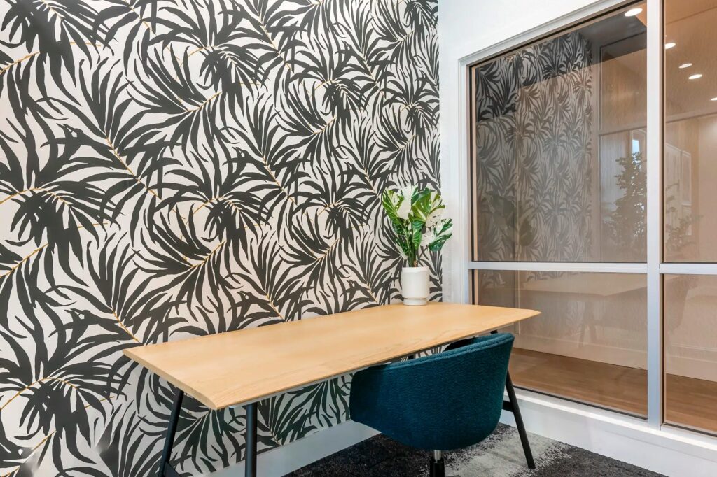 Private office inside of clubhouse business center with desk and chair