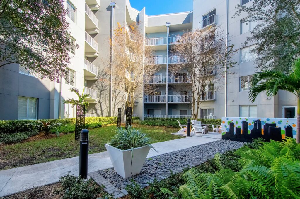 Courtyard with fire pit and seating area.